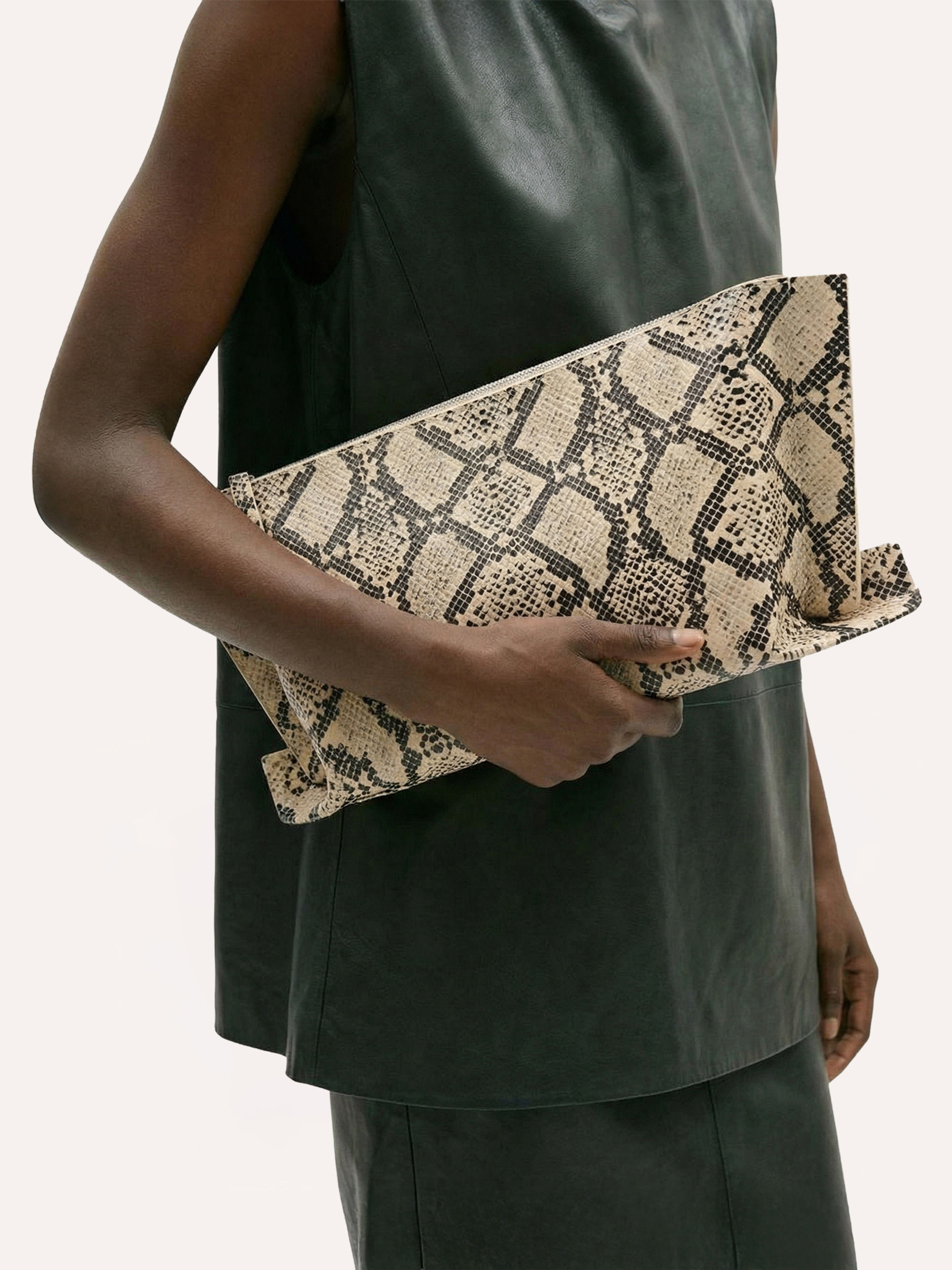 pinar clutch in snake-effect leather on model