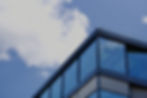 Header image of glass building