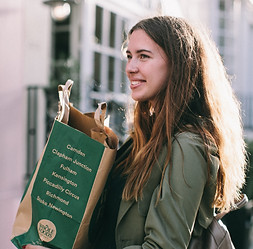 woman-carrying-paper-bag-1524123.jpg