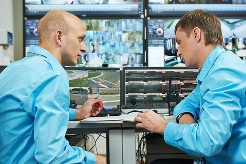 Security consultancy review in front of cctv monitors