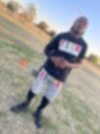 Man wearing F.I.T.K mukhtalif custom clothing outdoors