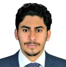 شاب يرتدي بدلة زرقاء وربطة عنق، صورة رسمية. تسجيل الماجستير المصغر