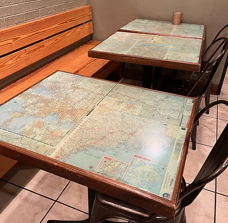 The tables in Tangent Eat and Bar that inspired the menu design and background