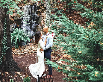 Chapel in the Park, Gatlinburg Tennessee, a couple getting married by a wooded waterfall in the Great Smoky Mountains
