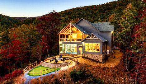 mountain vacation rental in Sevierville, Tennessee with golf putting green and firepit in the back