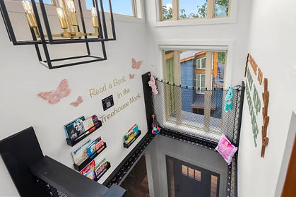 Dolly Parton themed Treehouse nook for reading inside a themed cabin in PIgeon Forge, Tennessee
