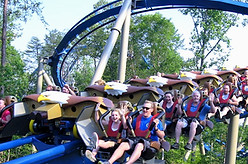 People riding a Dollywood roller coaster attraction, Pigeon Forge, TN