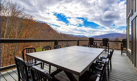 deck and outdoor diging at cabin with indoor pool in Gatlinburg Tn