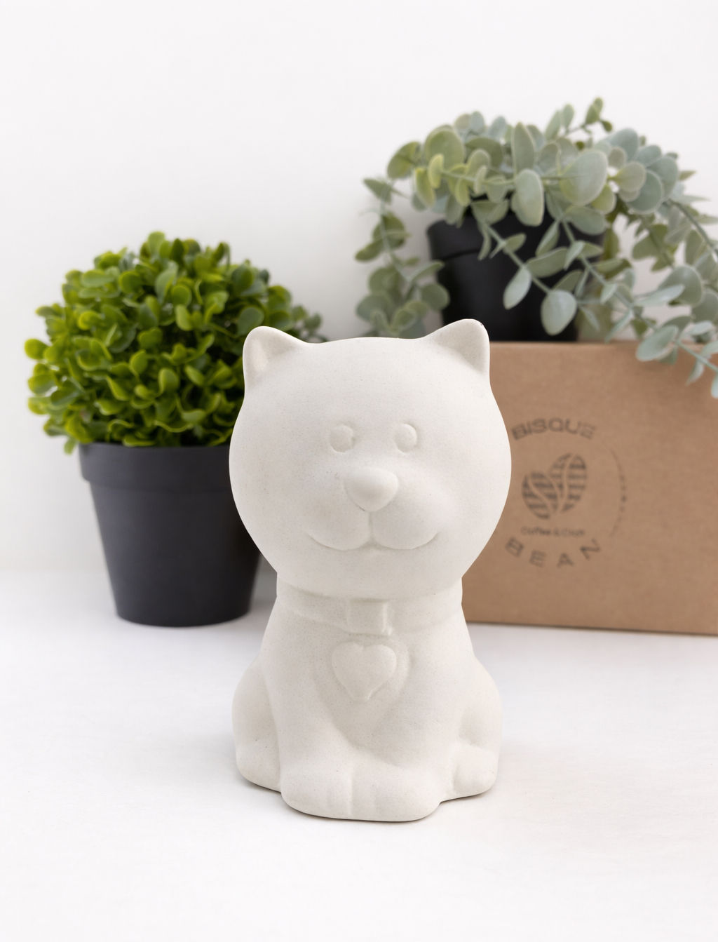 blank ceramic cat ornament with plants