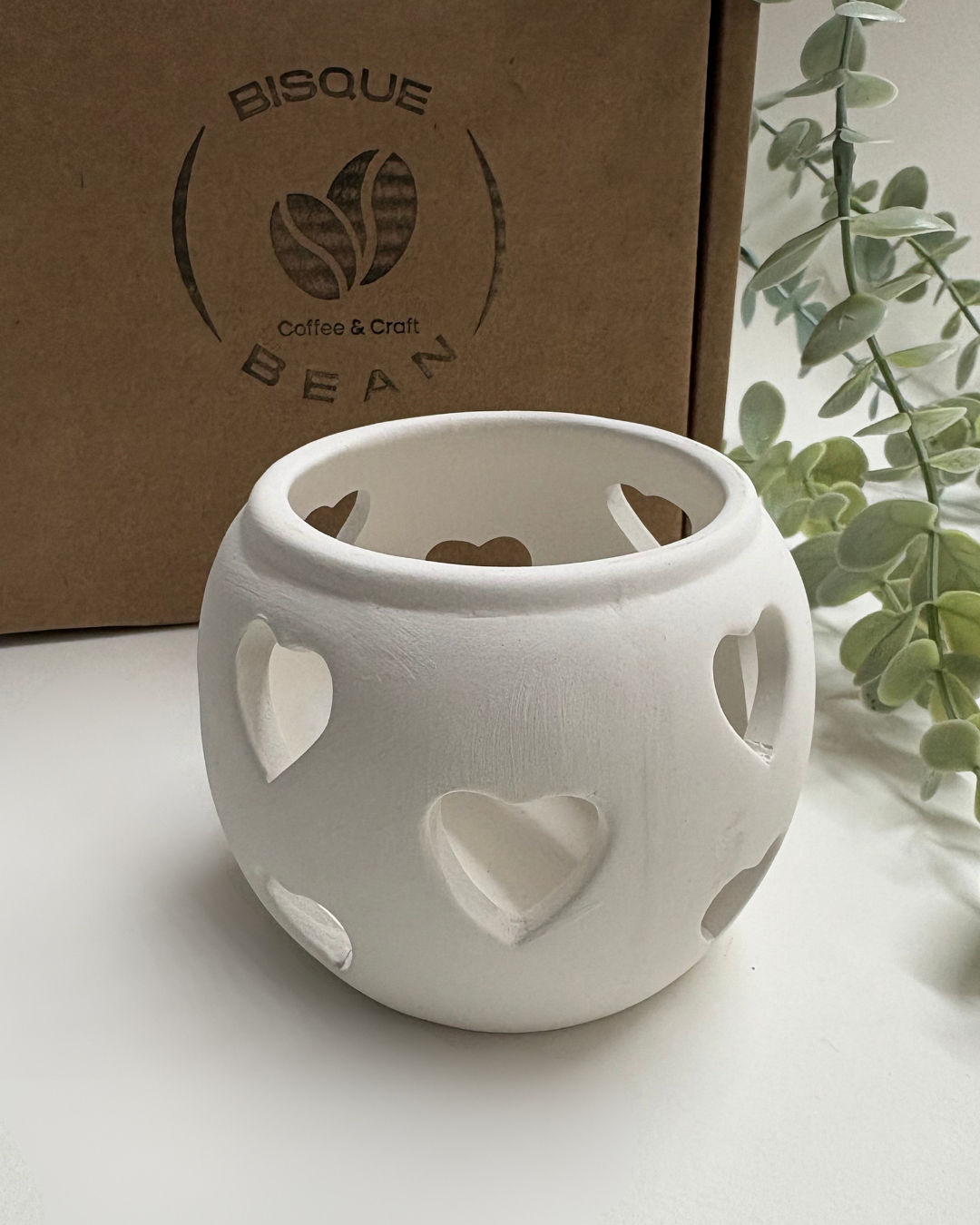 ceramic tea light candle holder with heart cut outs