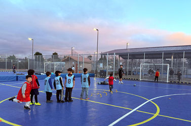 DSAL Soccer Program Participants Playing on the courts