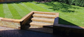Timber sleeper steps and lawn
