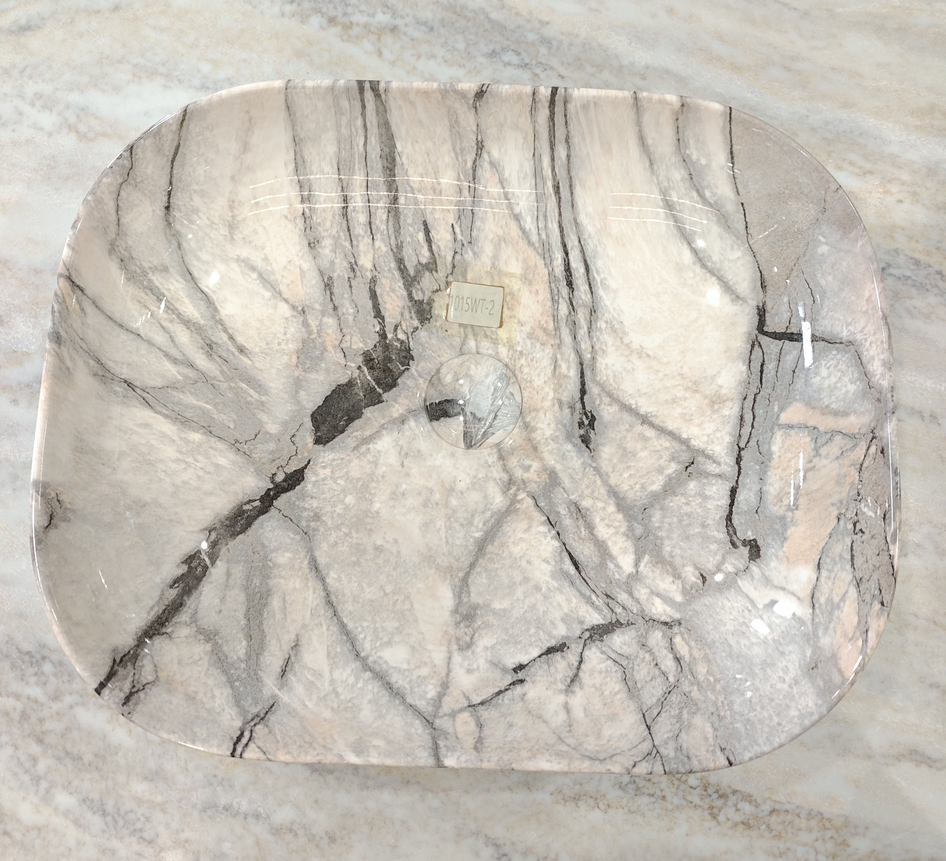 Arctic Storm Basin with dark veined marble pattern