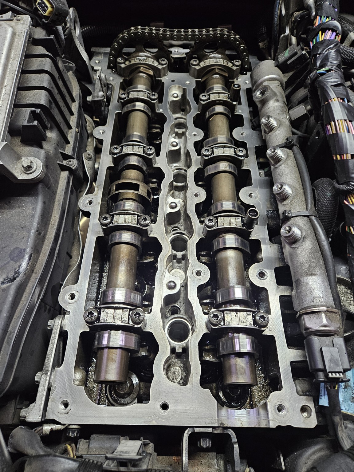 Genuine engine components and oil filter assembly at AG Performance