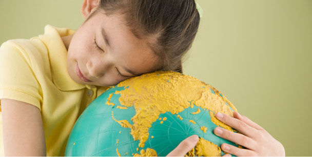 Girl Hugging Globe