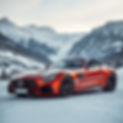 mercedes benz sports car with a snow mountain back drop.jpg