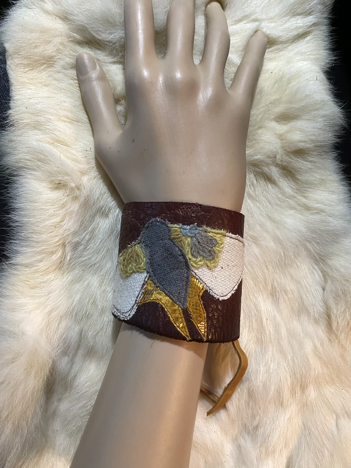 Leather scrappy moth cuff