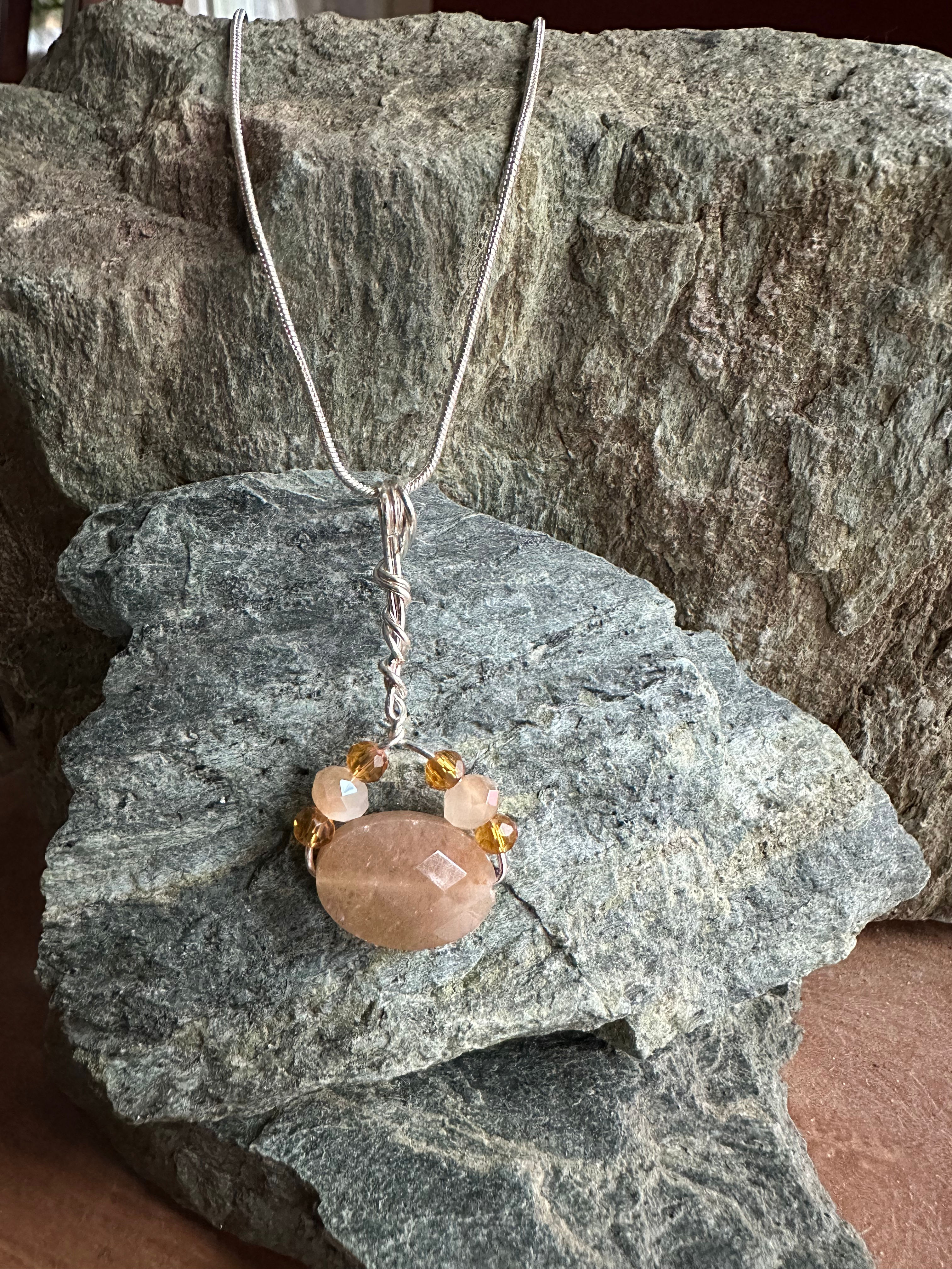 Beaded topaz color stone pendant on silver chain