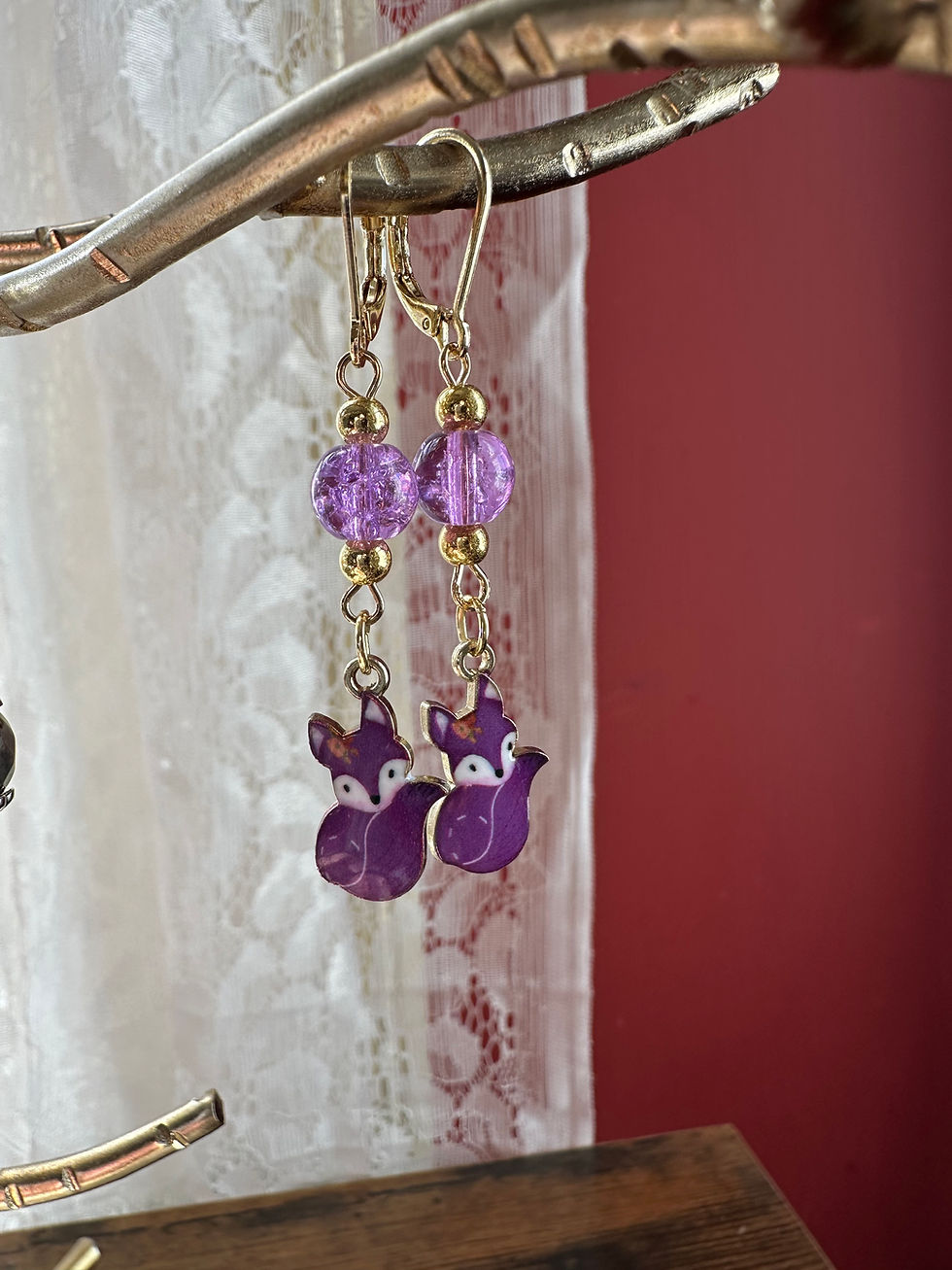Thumbnail: Purple fox dangles 