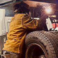 Welding repair on dump truck