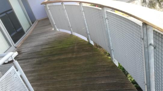 Wood decking before treatment with 4Earth Cleaning Supplies products