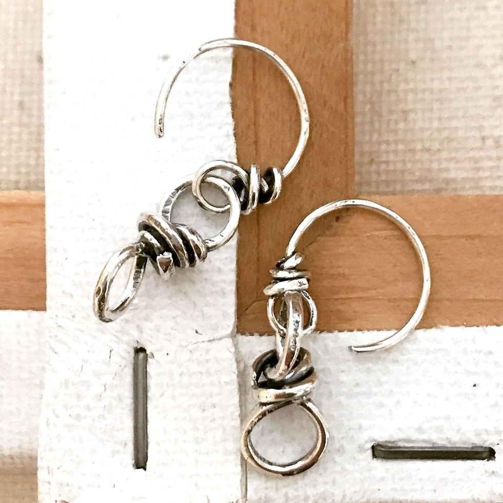 Thumbnail: Twist of Fate Hook Earring
