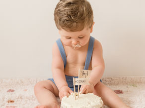"Newborn baby in cream knit during an at-home newborn session in Oxfordshire"