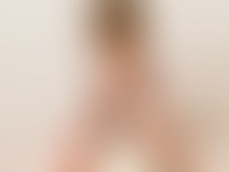 "Newborn baby in cream knit during an at-home newborn session in Oxfordshire"