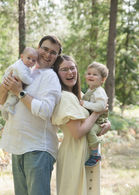 family outdoor portrait in the woods