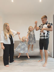 family portrait with toddler and newborn