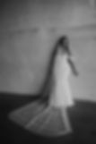Bride wearing a personalised wedding veil with vows and verse embroidery stitched across the tulle