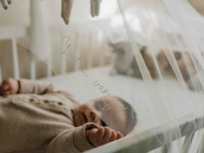 From Wedding Bliss to Baby's Crib: The Story of a Repurposed Bridal Veil