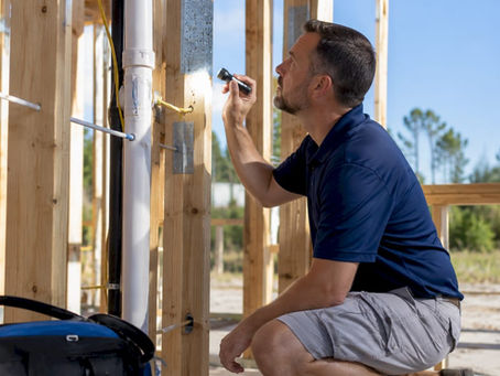 Gulf Coast home inspector examining pre-drywall framing