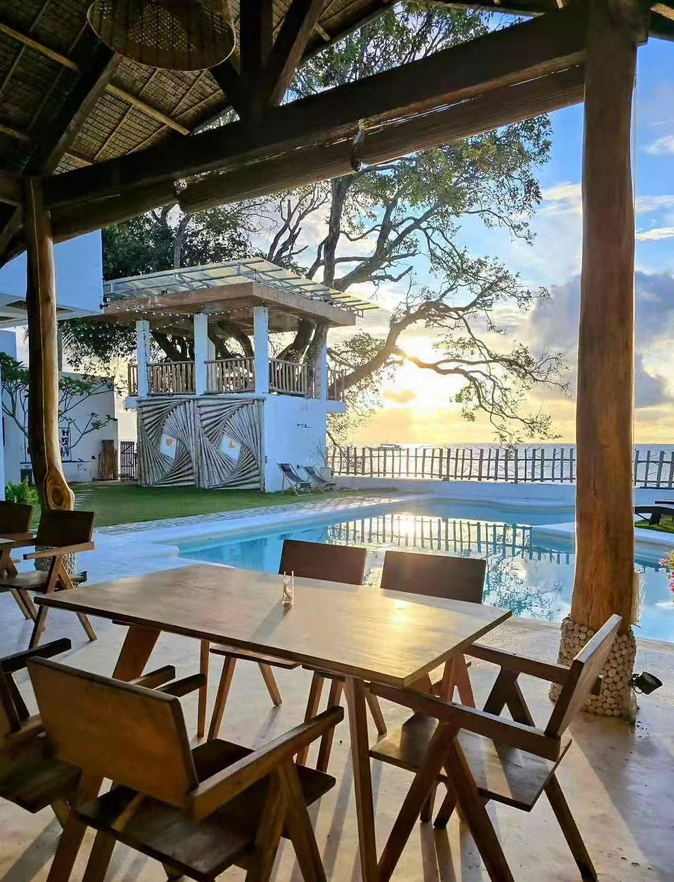Where to Stay in Dauin: Rooms, Food and Pool at a Shore-Entry Dive Resort