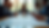 Close-up view of a conference table with diverse team members discussing technology plans