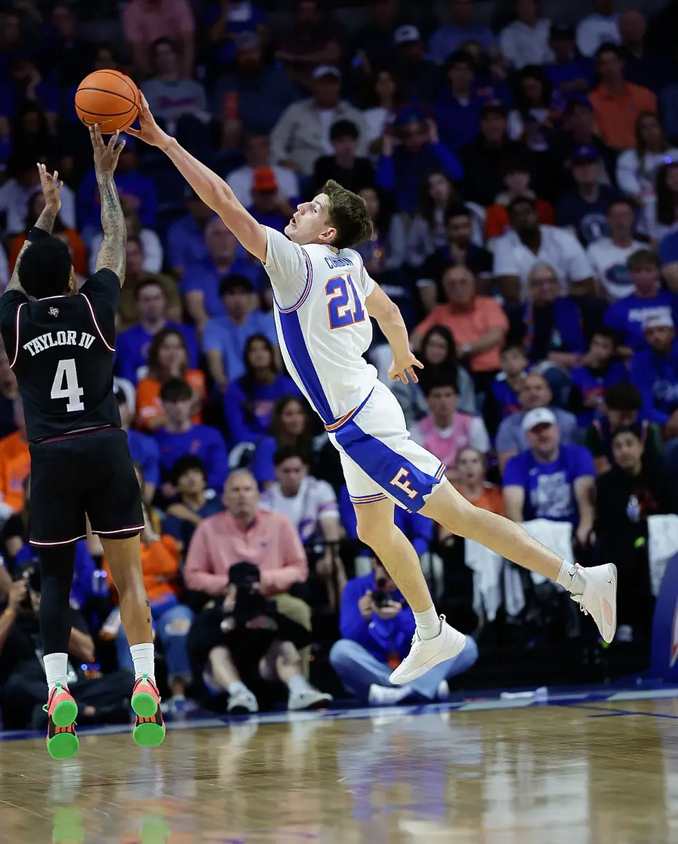 Alex Condon blocks a shot against Texas A&M (Photo by Chris Spears)