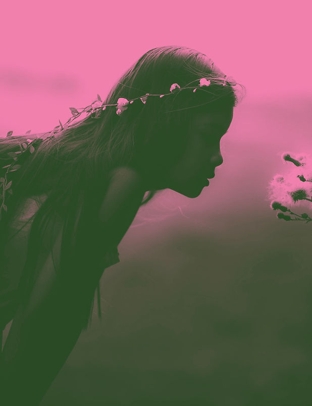 Girl Smelling Flowers
