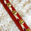 Thumbnail: Santa Strap - Red leather, white ties, green suede