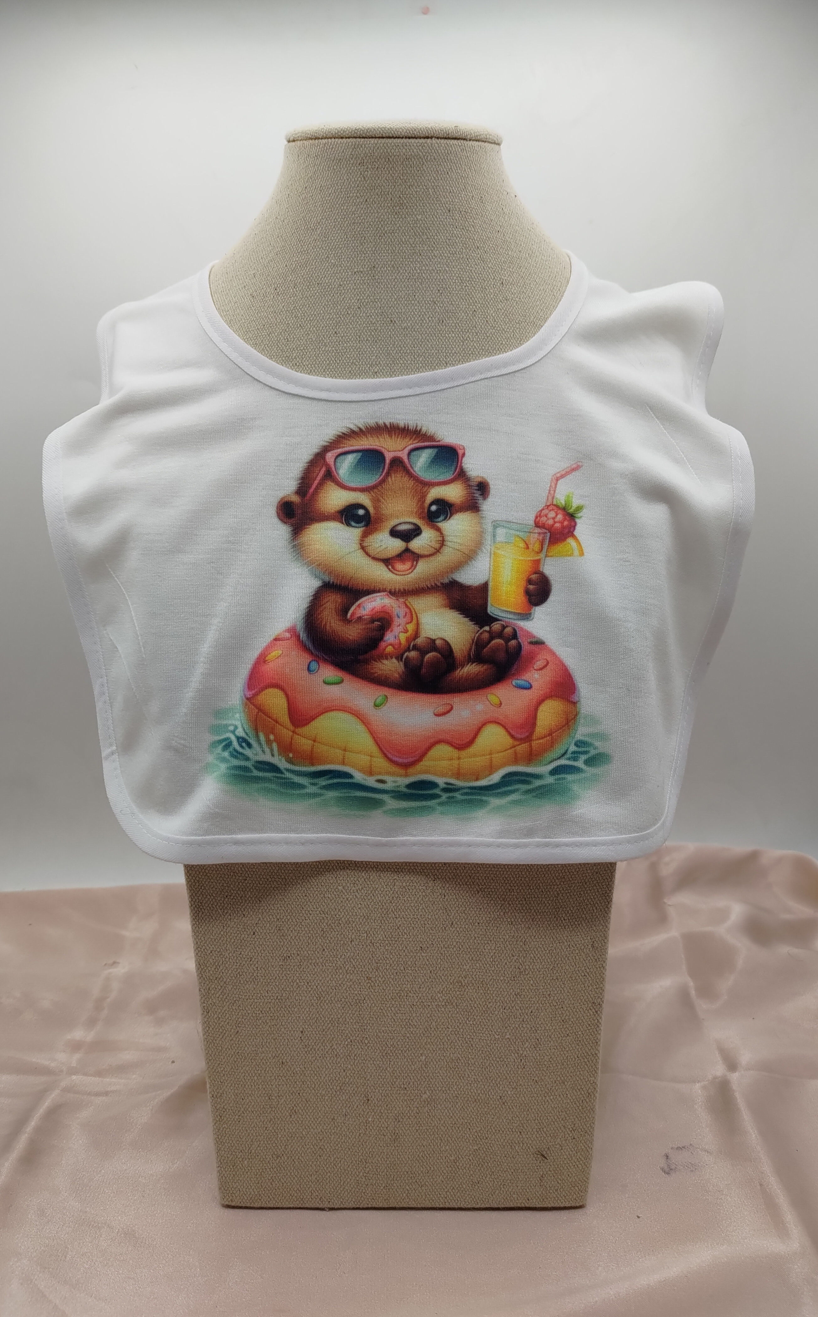 Bavoirs blanc a scratch donus