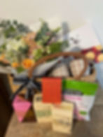 Cosy Indulgence Flower & Gift Bundle, a basket filled with pure indulgence