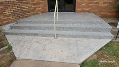 Commercial building entryway steps resurfaced with epoxy flake 