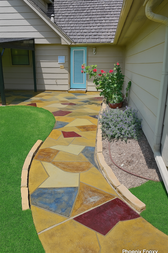 Custom multicolor stained and stamped concrete patio with
flagstone pattern in Abilene, Texas, installed by Phoenix Epoxy LLC