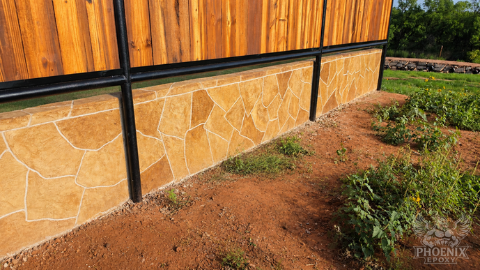Vertical decorative concrete overlay that looks like natural flagstone installed by Phoenix Epoxy in Abilene Tx.