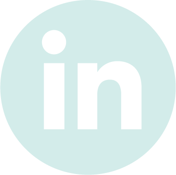 LinkedIn logo in a small white circle. Clicking this links to Marjuan Canady's LinkedIn profile. 