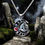 Thumbnail: Gothic Crescent Moon Gear Pendant Necklace with Red Gemstone Accent”