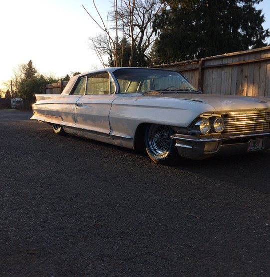 1962 Cadillac Coupe DeVille all back togetrher at sunset