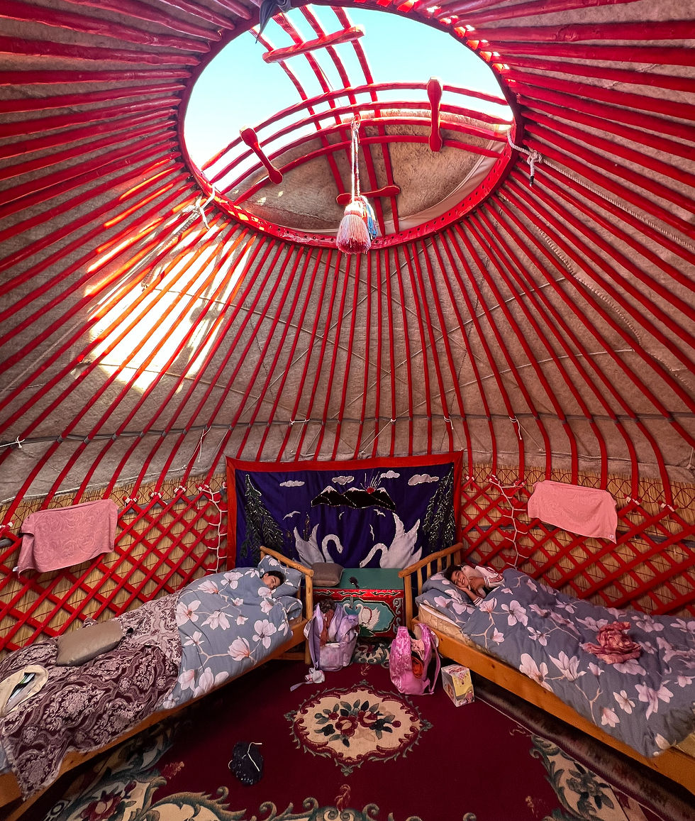 @ kids sleeping in a traditional yurt, in Kyrgyzstan