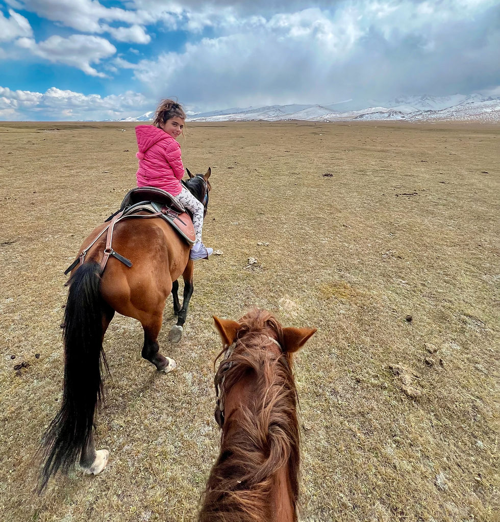 Horse riding with kids in Kyrgyzstan