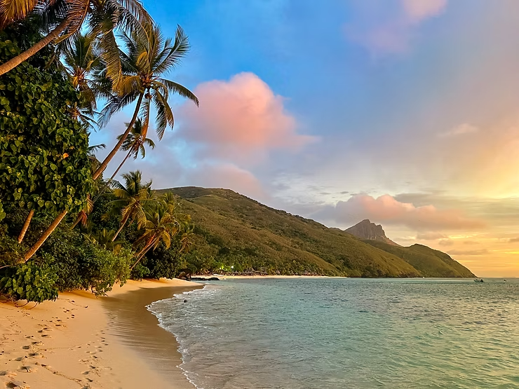 Sunset over a tropical Fijian Island