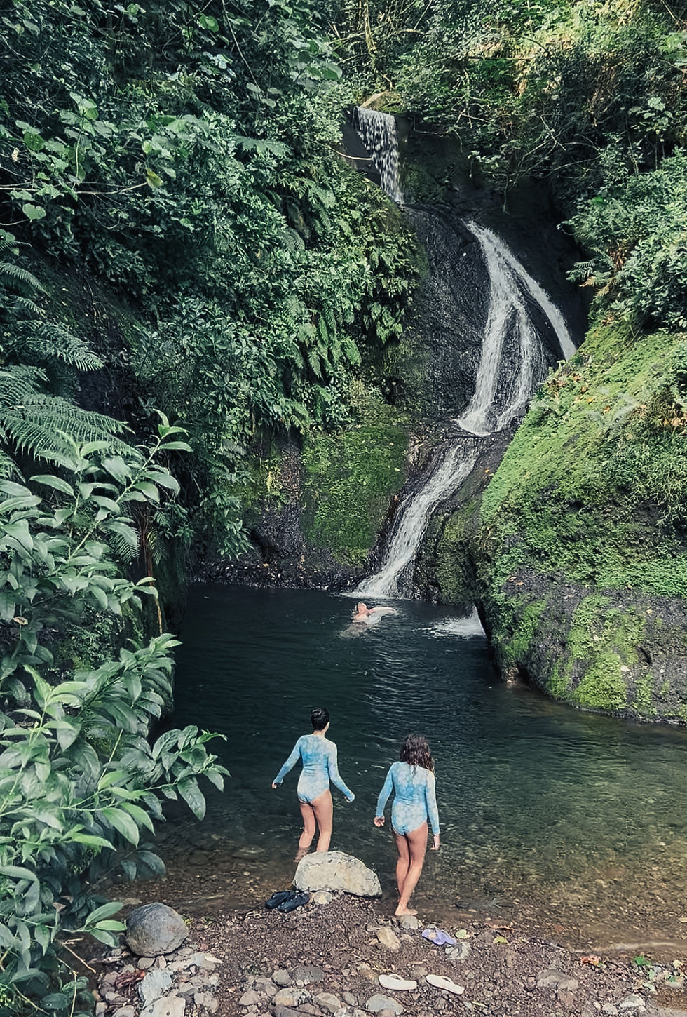 2 girls at a waterfall, Cook Islands